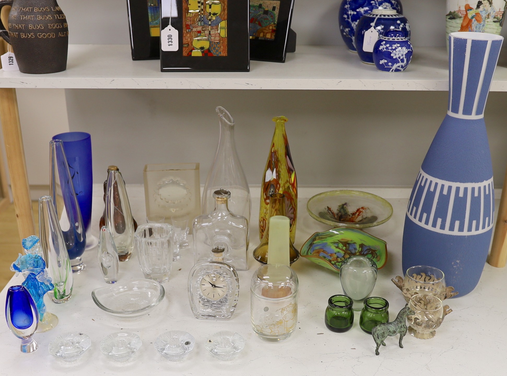 A collection of assorted Scandinavian glassware including Kosta, Erik Hoglund for Boda and Tapio Wirkkala, tallest 58cm